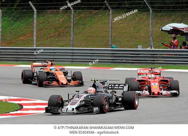 Formula 1 Malaysian Grand Prix - Race Day Featuring: Kevin MAGNUSSEN, Sebastian VETTEL, Fernando ALONSO Where: Sepang, Selangor