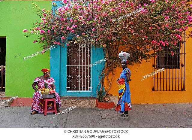 Palenque woman selling fruits in downtown colonial walled city, Cartagena, Colombia, South America