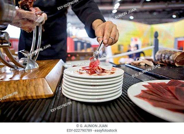 Serving acorn-fed Iberian ham