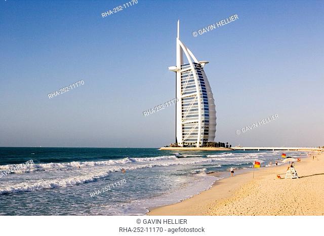 The iconic symbol of Dubai, the Burj Al Arab, the world's first seven star hotel classified as five star deluxe, built on an artificial island offshore from the...