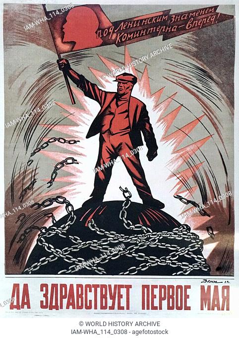 1929 Communist Russian propaganda poster. Depicts a worker breaking his chains under a flag with a portrait of Lenin. The slogan reads 'Long live May Day