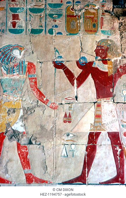 Detail of painted low relief of Tuthmosis III before Horus, Temple of Queen Hatshepsut, Luxor, Egypt, 18th Dynasty, c15th century BC