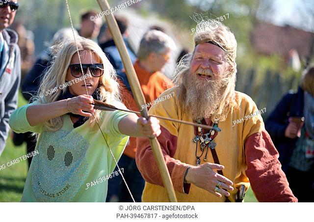 Singer Natalie Horler from the band Cascada representing Germany trained by Per in shooting with bow and arrow during a trip of the German delegation to Skanoer...