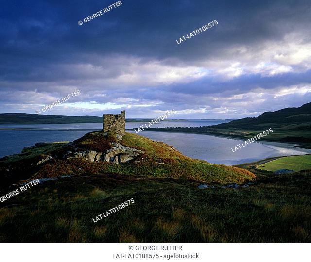 Wester Ross. North coast. Kyle of Tonque, inlet. Ruined castle keep on headland. Sea, shore
