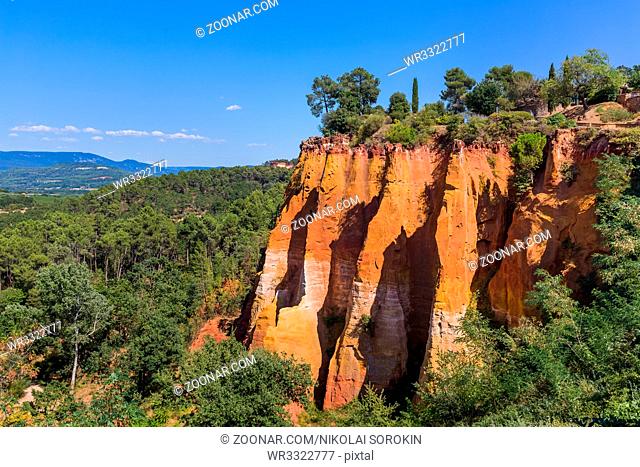 Ochre hills near Roussillon in Provence France - travel and nature background