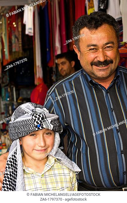 Portrait of a Turkish father and son with a turbant in Cappadocia, Nevsehir, Anatolia, Turkey