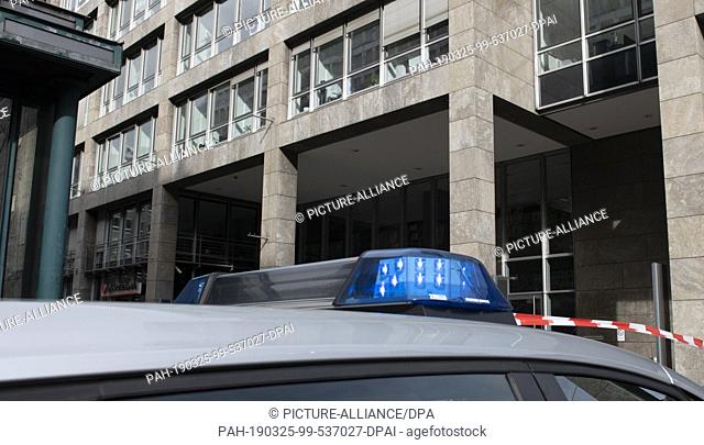25 March 2019, Berlin: Police vehicles are parked at the corner of Friedrichstraße and Leipziger Straße. A suspicious envelope had been found in the New Zealand...