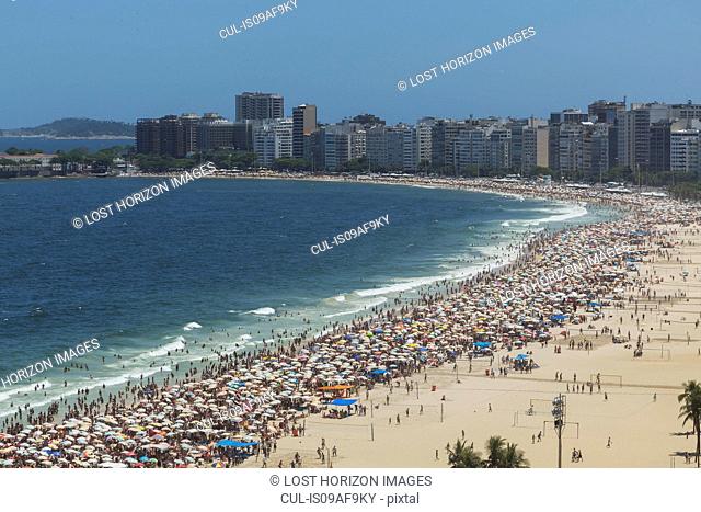 Crowds of holiday makers on Ipanema beach, Rio De Janeiro, Brazil