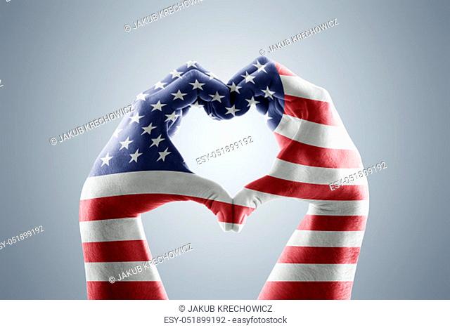 Two hands in the form of heart with Usa flag