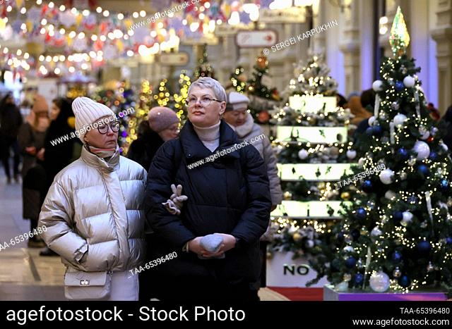 RUSSIA, MOSCOW - DECEMBER 1, 2023: People visit the GUM department store decorated for the holiday season. Sergei Karpukhin/TASS
