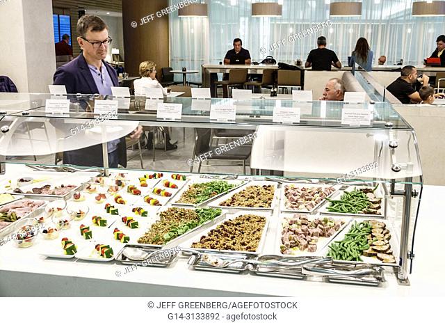 Florida, Miami, International Airport MIA, terminal concourse gate area, American Airlines business class Flagship lounge, dining, buffet, man