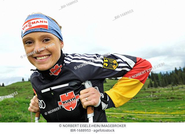 Evi Sachenbacher-Stehle, gold medalist from Vancouver, Nordic walking training on the Eggenalm alpine pasture, Reit im Winkl, Bavaria, Germany, Tyrol, Austria