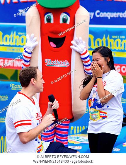 Competitive eaterJoey Chestnut proposes to his girlfriend Neslie Ricasa at The Annual World-Famous Nathan's International Hot Dog Eating Contest in Coney Island