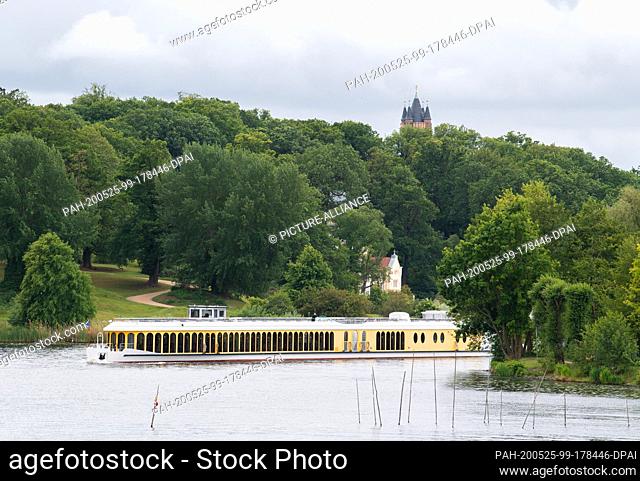 25 May 2020, Brandenburg, Potsdam: The ship ""MS Sanssouci"" of the White Fleet sails from the harbour on the Deep Lake or Glienicker Lake past the Little...