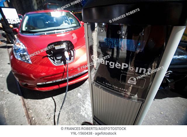 HERTZ INTRODUCES PLUG-IN HYBRID ELECTRIC VEHICLES ON A RENTAL AND CAR SHARING BASIS  A Nissan Leaf being charged by a Coulomb ChargePoint charging station