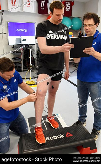 15 May 2020, Saxony, Leipzig: Paul Biedermann, former swimmer and world record holder for 200 and 400 m freestyle, is being prepared for a test on a...