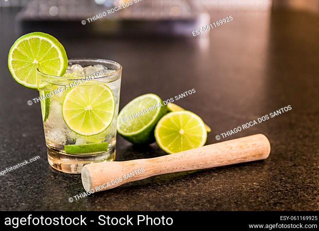 Caipirinha, traditional Brazilian alcoholic drink, typical drink made with sugar, lemon, distilled cane (cachaca) and ice
