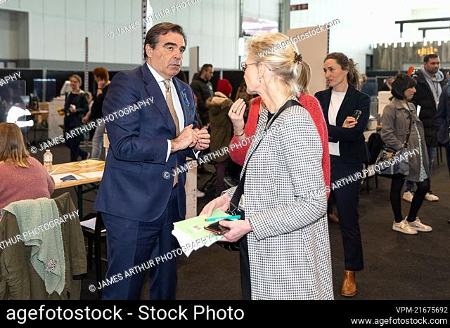 European Commissioner for Asylum Margaritis Schinas (L) pictured during the opening of a center for the registration of Ukrainian refugees