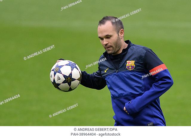 FC Barcelona's Andres Iniesta kicks the ball during a training session at Allianz Arena in Munich,  Germany, 22 April 2013