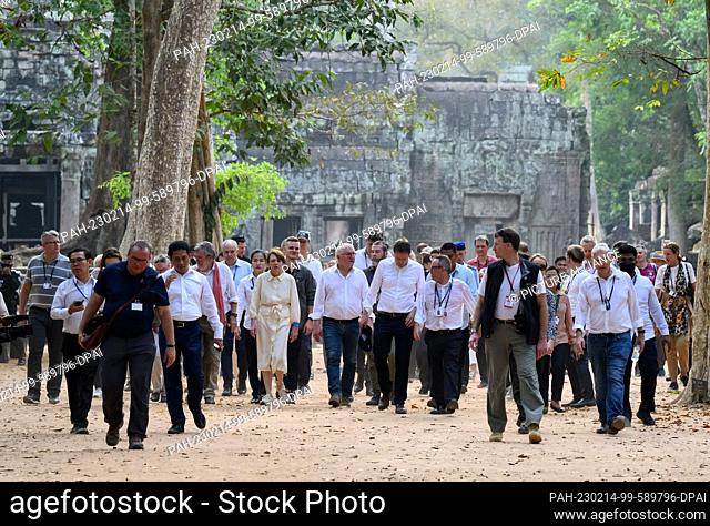 14 February 2023, Cambodia, Siemreab: German President Frank-Walter Steinmeier and his wife Elke Büdenbender visit the Ta Prohm temple complex near Angkor Wat