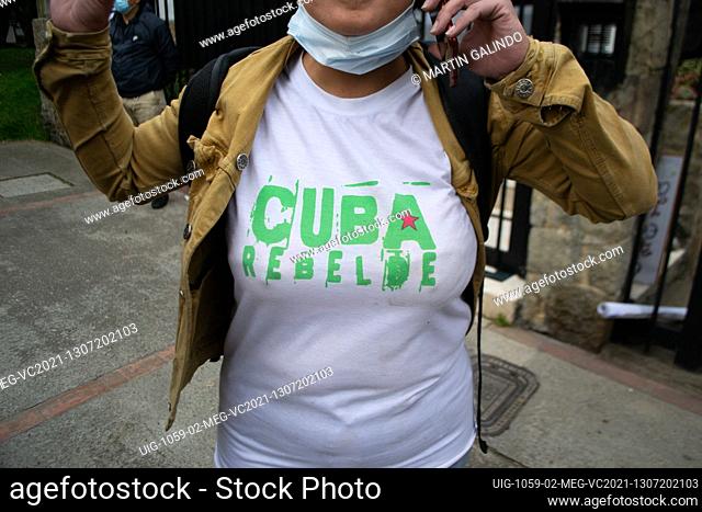 A Cuban resident has a shirt that reads ""Rebel Cuba"" as Cuban residents residing in Colombia that protest against the president Miguel Diaz-Cannel protest in...