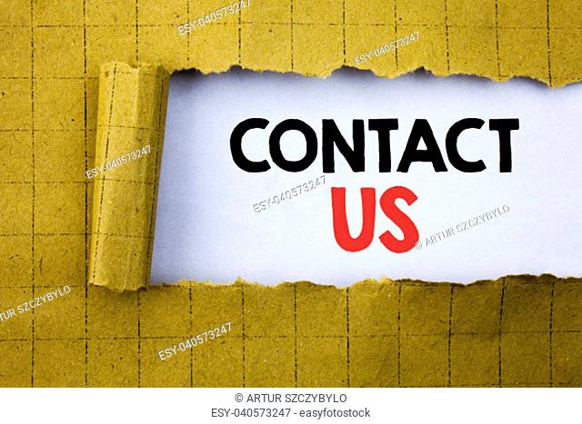 Contact Us. Business concept for Customer Support written on white paper on yellow folded paper