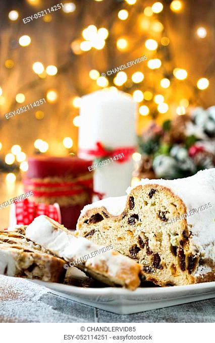 Christmas stollen. Traditional German Christmas dessert on wooden background