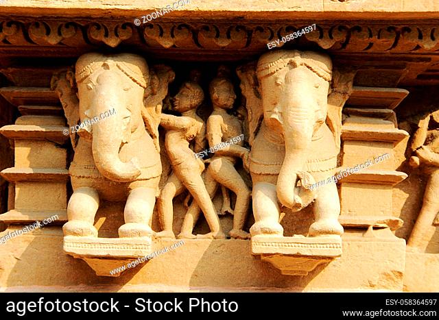 Sculpture of men taking care of royal elephants at Lakshman Temple under Western Group of Temples in Khajuraho, Madhya Pradesh, India, Asia
