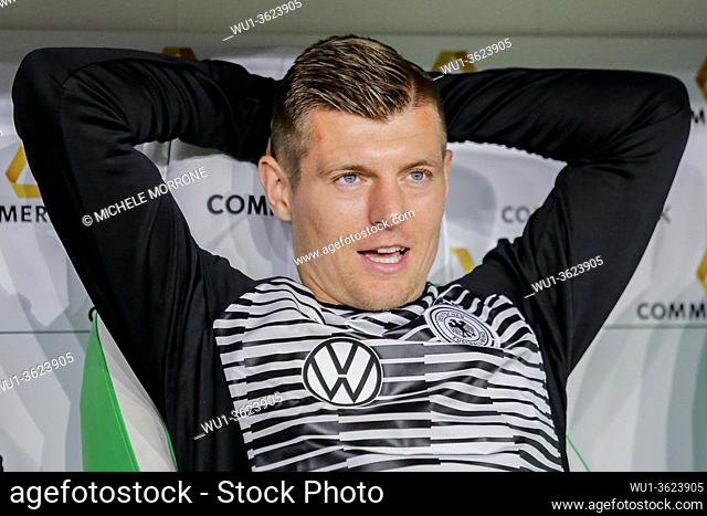 Wolfsburg, Germany, March 20, 2019: Germany national team footballer Toni Kroos sitting on the bench during the international soccer game Germany vs Serbia at...