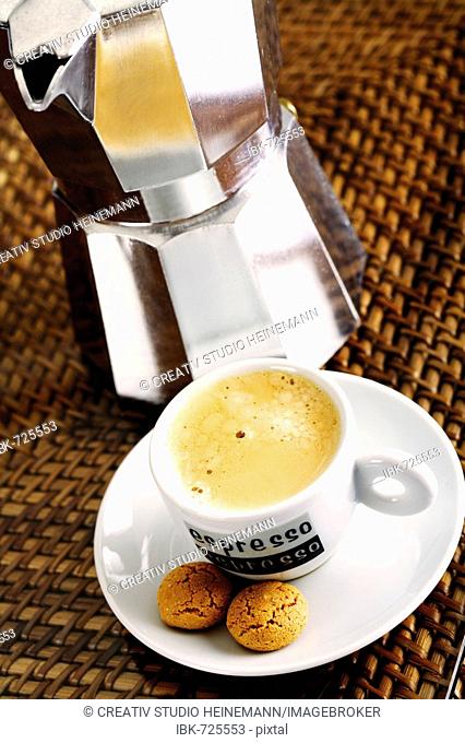 Cup of espresso with amarettini biscuits