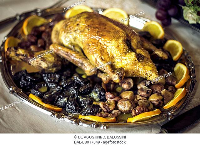 Roast guinea fowl with chestnuts and prunes, court life in the Stupinigi hunting lodge, Italy, 18th century. Historical re-enactment