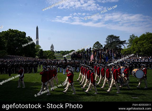 The Old Guard Fife and Drum Corps performs at an arrival ceremony during a state visit with on the South Lawn of the White House in Washington, DC, US