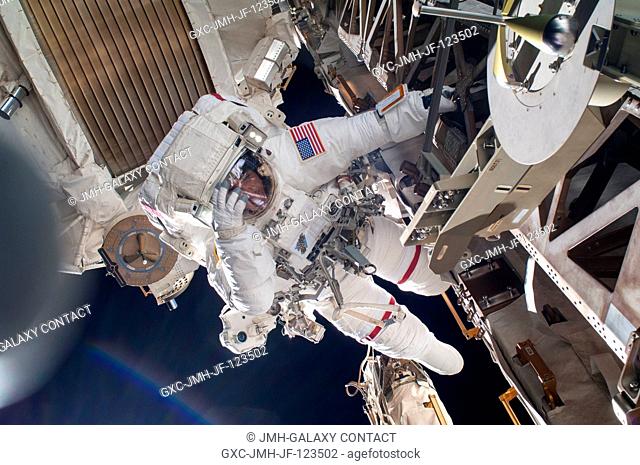 NASA astronaut Chris Cassidy, Expedition 36 flight engineer, participates in a session of extravehicular activity (EVA) as work continues on the International...