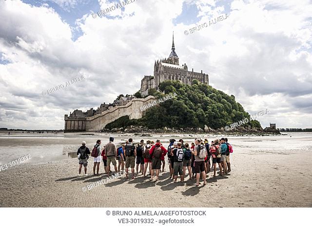 Guided tour to cross Mont Saint Michel bay during low tide (department of Manche, region of Normandie, France)