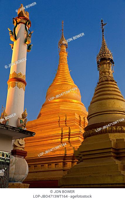 Myanmar, Mandalay, Mandalay. Floodlit pagoda at dusk on the top of Mandalay Hill in Myanmar