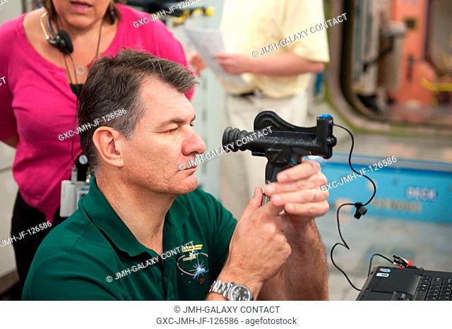 European Space Agency (ESA) astronaut Paolo Nespoli, Expedition 2627 flight engineer, participates in a routine operations training session in an International...