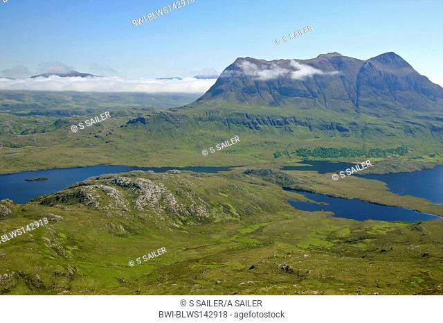 view from Stac Pollaidh over Loch Sionascaig to Suilven with it's summit enveloped in dispersing clouds, United Kingdom, Scotland, Highlands
