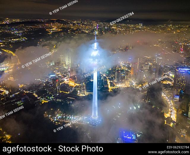 Bukit Bintang, Kuala Lumpur, Malaysia - Nov 12 2022: The KL Tower's illumination in night, creating a dynamic display of lights that adds to the excitement of...