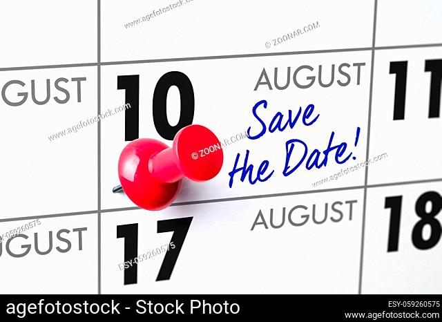 Wall calendar with a red pin - August 10