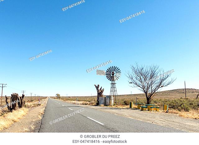 A water-pumping windmill and picnic spot on road R48 between Phillipstown and De Aar in the Northern Cape Province