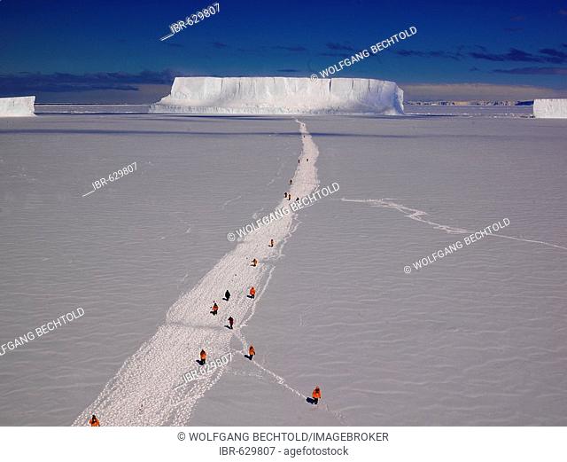 Hike over sea ice to a big iceberg in front of Cape Washington, Ross Sea, Antarctic