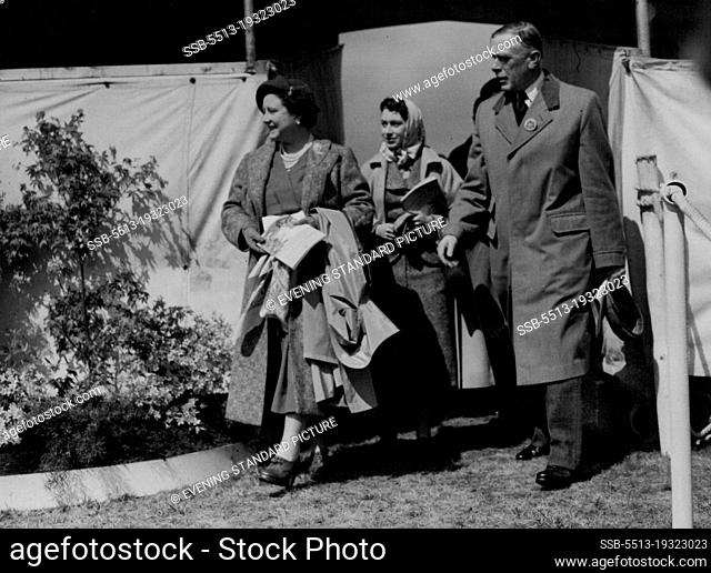 The Queen Mother, carrying a mackintosh in case of showers, and Princess Margaret in a gay head scarf arrive to watch the Trials. May 18, 1955