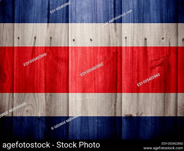 Costa Rica flag painted on wooden fence