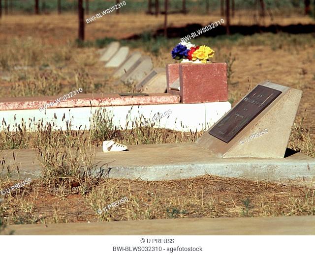 grave with placed childrens shoe, Australia