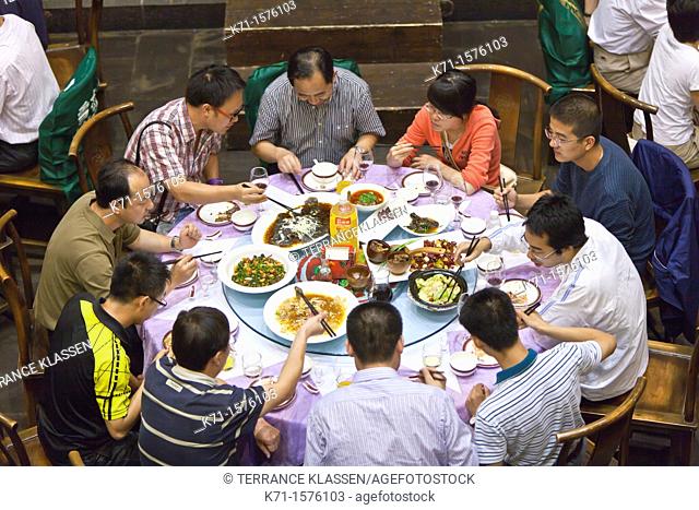 Family style Chinese meal in a restaurant in Chengdu, Sechuan, China