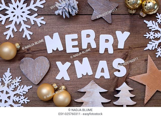White Letters With Word Merry Xmas On Brown Wooden Background. Christmas Greeting Card. Rustic, Vintage Style. Christmas Decoration, Christmas Tree, Snowflakes
