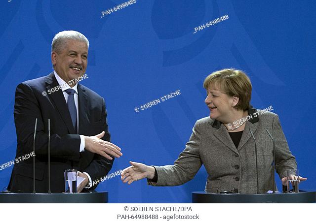 German Chancellor Angela Merkel (R) and Algeria's Prime Minister Abdelmalek Sellal shake hands following a joint press conference in Berlin,  Germany