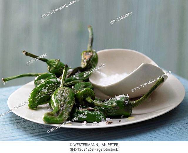 Pan-fried mini green peppers in with olive oil and sea salt