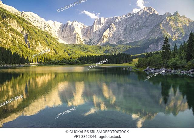 Superior Fusine Lake with Mount Mangart on the background. Fusine Lakes Natural Park, Tarvisio, Udine province, Friuli Venezia Giulia, Italy