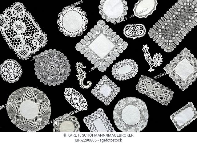 Panel with lace doilys, various shapes and patterns